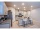 Stylish kitchen featuring an island with seating, stainless steel appliances, and abundant cabinet space at 10281 Sequoia Falls Pl, Las Vegas, NV 89149