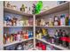 Walk-in pantry with ample shelving provides lots of space for food storage at 10281 Sequoia Falls Pl, Las Vegas, NV 89149