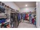 Well-organized walk-in closet with ample hanging space and shelving at 10281 Sequoia Falls Pl, Las Vegas, NV 89149