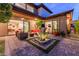 Beautiful patio design with an outdoor water feature, cozy seating, and a view of the indoor space at 10313 Jade Point Dr, Las Vegas, NV 89135