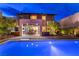 Gorgeous backyard featuring a refreshing pool and a patio with outdoor dining area, perfect for relaxation at 10313 Jade Point Dr, Las Vegas, NV 89135