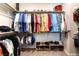 Spacious walk-in closet with rods, shelves, and shoe storage, offering plenty of room for clothes at 10313 Jade Point Dr, Las Vegas, NV 89135