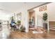 Bright entryway showcasing the staircase, office space, and hardwood flooring at 10313 Jade Point Dr, Las Vegas, NV 89135