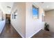 Bright hallway with natural light and wood flooring at 10313 Jade Point Dr, Las Vegas, NV 89135