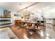 Open concept living space featuring a fireplace, dining area, and modern decor at 10313 Jade Point Dr, Las Vegas, NV 89135