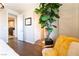 Cozy sitting area with wood floors, a chair, and access to the bedroom and laundry room at 10313 Jade Point Dr, Las Vegas, NV 89135