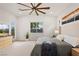 Bright and airy main bedroom with large windows and access to an outdoor seating area at 11813 Pippa Ave, Las Vegas, NV 89138