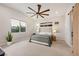 Spacious main bedroom featuring a large window and stylish decor for a relaxing retreat at 11813 Pippa Ave, Las Vegas, NV 89138
