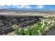 Scenic aerial view of community with walking path and desert landscape at 1324 European Dr, Henderson, NV 89052