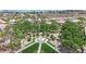 A beautifully landscaped community park featuring a central water feature at 1324 European Dr, Henderson, NV 89052