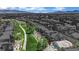A serene community view with lush green walking path and mountains at 1324 European Dr, Henderson, NV 89052