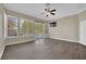 Bedroom with views of the pool and backyard, hardwood floors, and neutral decor at 1324 European Dr, Henderson, NV 89052
