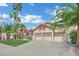 Well maintained home with a three car garage, desert landscaping and unique architectural details at 1324 European Dr, Henderson, NV 89052