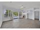 Bright living room with a fireplace, doors to a pool area, and neutral decor at 1324 European Dr, Henderson, NV 89052