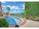 Gorgeous pool with a tranquil view, perfect for relaxing and enjoying the beautiful outdoor scenery at 1324 European Dr, Henderson, NV 89052
