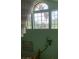 Bright entryway featuring large windows and greenery accents at 1385 Ringe Ln, Las Vegas, NV 89110