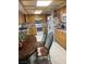 Eat in kitchen featuring light wood cabinets and tile floors at 1385 Ringe Ln, Las Vegas, NV 89110