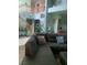 Spacious living room with high ceilings and a staircase leading to the second floor at 1385 Ringe Ln, Las Vegas, NV 89110