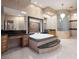 Luxurious primary bathroom boasts a jetted tub, dual vanities, and stylish decorative accents at 1665 Liege Dr, Henderson, NV 89012