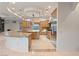 Gourmet kitchen features a spacious island, stainless appliances, and recessed lighting at 1665 Liege Dr, Henderson, NV 89012