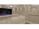 Bright living room boasts recessed lighting, coffered ceilings, and access to backyard pool area at 1665 Liege Dr, Henderson, NV 89012