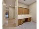 This office features custom built-in cabinets, drawers and a bright desk area at 1665 Liege Dr, Henderson, NV 89012