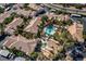 Expansive community with lush greenery surrounding a resort-style pool at 1830 N Buffalo Dr # 1031, Las Vegas, NV 89128