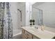 Bright bathroom showcasing a tub and a charming vanity with ample counter space at 1830 N Buffalo Dr # 1031, Las Vegas, NV 89128