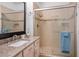 Bathroom featuring a vanity and shower with glass door at 1830 N Buffalo Dr # 1031, Las Vegas, NV 89128