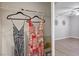 Walk-in closet with rods and shelving for organizing clothes at 1830 N Buffalo Dr # 1031, Las Vegas, NV 89128