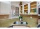 Bright kitchen area showcasing a stainless steel sink and stainless steel oven at 1830 N Buffalo Dr # 1031, Las Vegas, NV 89128