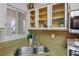 Bright kitchen area showcasing a stainless steel sink and stainless steel oven at 1830 N Buffalo Dr # 1031, Las Vegas, NV 89128