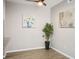 Well-lit living area with hardwood floors, neutral walls, and contemporary decor at 1830 N Buffalo Dr # 1031, Las Vegas, NV 89128