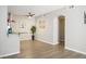 Bright and open living space featuring hardwood floors, a ceiling fan and neutral-toned walls at 1830 N Buffalo Dr # 1031, Las Vegas, NV 89128