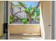 View of exterior courtyard from patio, showing lush greenery and landscaping at 1830 N Buffalo Dr # 1031, Las Vegas, NV 89128