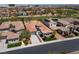 Scenic aerial view overlooking the home's manicured landscaping, and the street at 2080 Orchard Mist St, Las Vegas, NV 89135