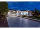 Beautiful single story home featuring a gated courtyard and wide driveway at 2080 Orchard Mist St, Las Vegas, NV 89135