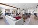 Spacious living room with an open floor plan view to the kitchen and dining areas at 2080 Orchard Mist St, Las Vegas, NV 89135