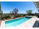 Private pool and spa with manicured landscaping and clear blue skies at 2080 Orchard Mist St, Las Vegas, NV 89135