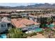 Beautiful home showcasing back exterior, manicured yard, and private pool at 2080 Orchard Mist St, Las Vegas, NV 89135