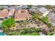 Serene aerial shot of a home showcasing desert landscaping, a covered patio, and well-manicured greenery at 2764 Leys Burnett Ave, Henderson, NV 89044