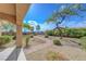 Landscaped backyard featuring a stone path and desert landscaping at 2764 Leys Burnett Ave, Henderson, NV 89044