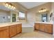 Bathroom with double sinks, a soaking tub, and a separate shower stall at 2764 Leys Burnett Ave, Henderson, NV 89044