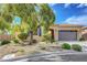 Beautiful single-story home featuring desert landscaping, a gated front entry, and a convenient two-car garage at 2764 Leys Burnett Ave, Henderson, NV 89044