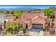 Lovely home with tile roof, attached garage, and desert-friendly landscaping in a serene community at 2764 Leys Burnett Ave, Henderson, NV 89044