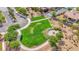 Community green space with walking paths and flowering planters, close to residential area at 2764 Leys Burnett Ave, Henderson, NV 89044
