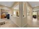 Open-concept interior featuring tile flooring, neutral walls, and seamless flow between living spaces at 2764 Leys Burnett Ave, Henderson, NV 89044