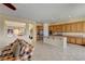Open-concept living room with a view into the kitchen and dining area at 2764 Leys Burnett Ave, Henderson, NV 89044
