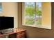 Desk in an office featuring a view of a beautifully landscaped backyard at 2764 Leys Burnett Ave, Henderson, NV 89044