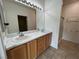 Double sink bathroom with lots of counter space and tile flooring at 3029 Frigate Way, North Las Vegas, NV 89084